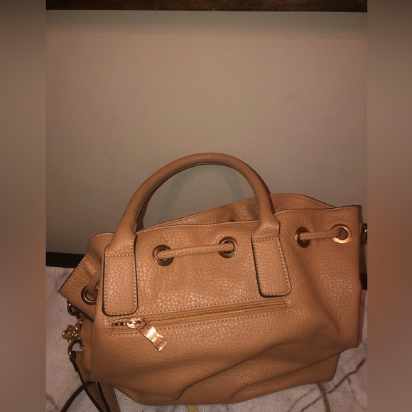 Handbag with black and white stripes inside; classy bag can dress up or down - Picture 7 of 8